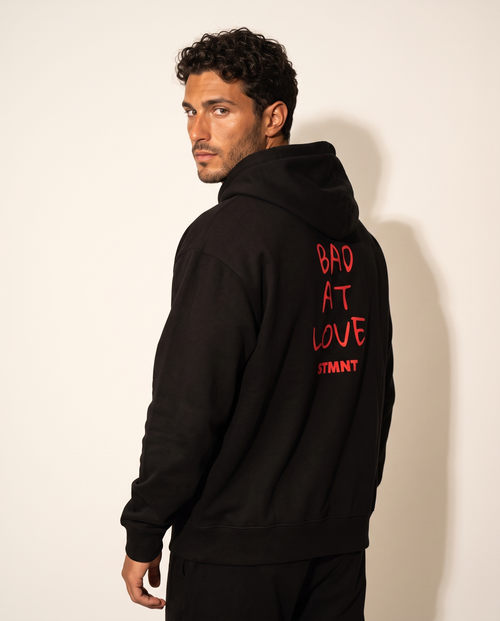 Bad At Love Oversized Hoodie worn by model