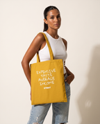 Expensive Taste Tote Bag carried by model